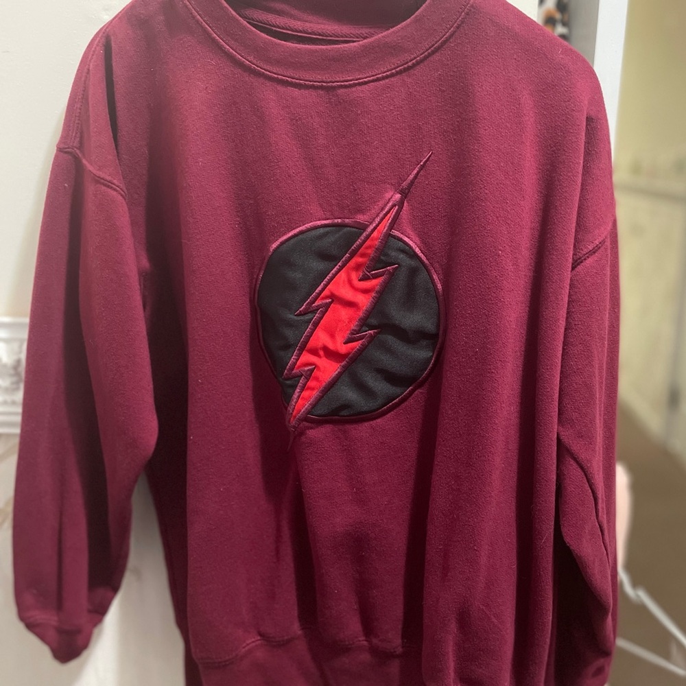Maroon 90s crew neck sweater. Justice league